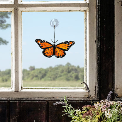 Close-up of colorful monarch butterfly stained glass suncatcher