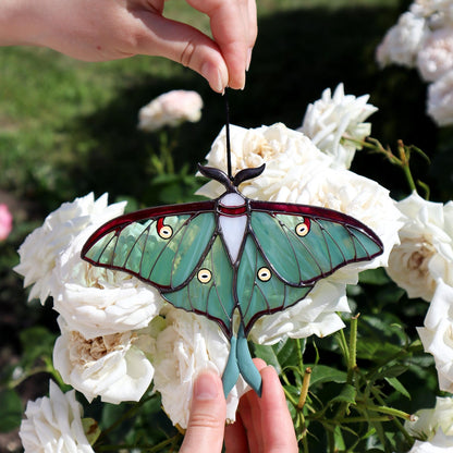 Close-up of Luna Moth Butterfly stained glass suncatcher