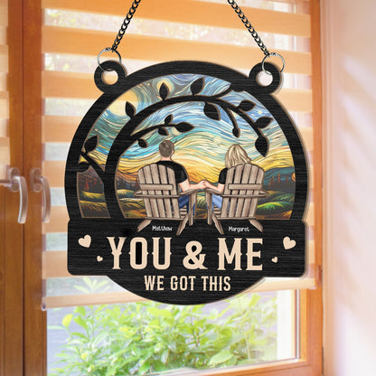 Romantic heart-shaped suncatcher for couples hanging in a window